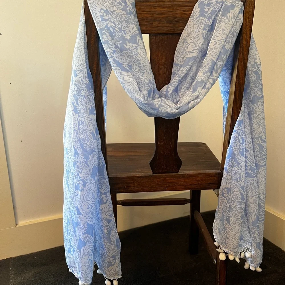 Light weight blue and white scarf. Polyester. With Pom poms at either end - Picture 4 of 9